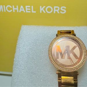 Michael Kors Watch-beautiful gold  with like diamonds around it fairly new
